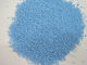 o SSA colorido do pó detergente salpica salpicos azuis
