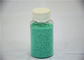O sulfato de sódio verde dos salpicos da cor dos grânulo salpica produtos químicos da limpeza